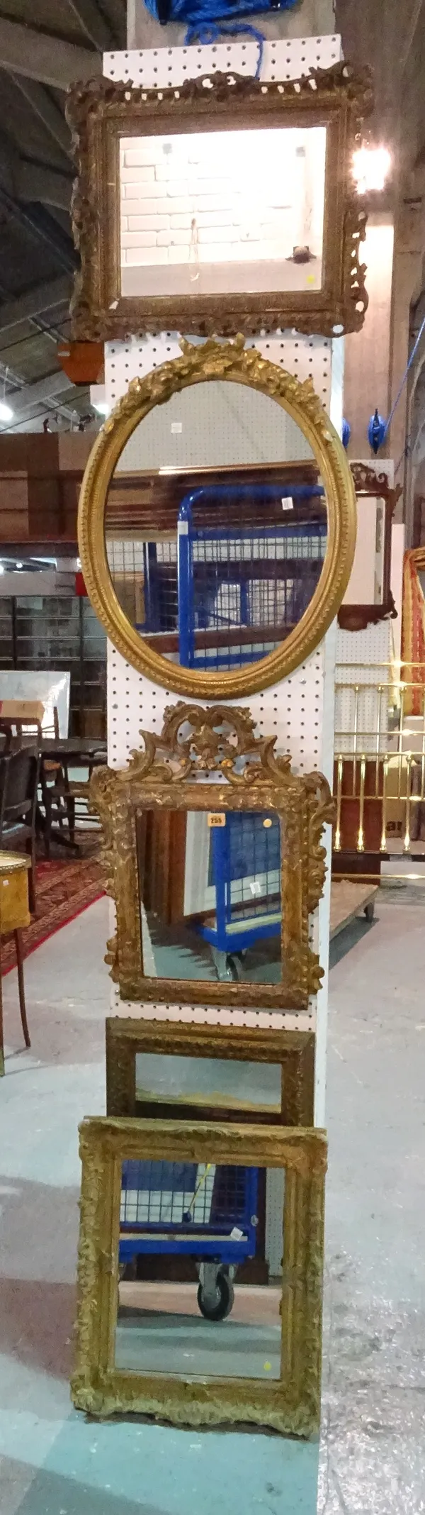 A group of four 19th century and later gilt framed wall mirrors, the largest 50cm wide x 65cm high.  D5