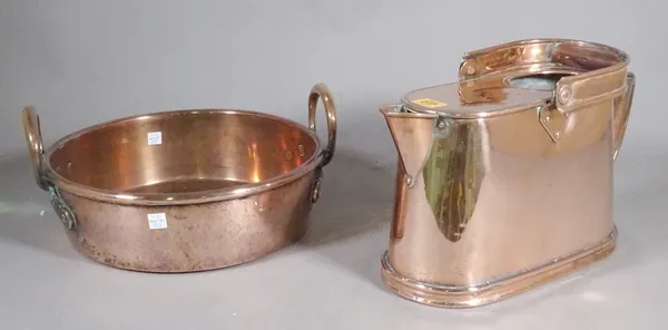 An early 20th century oval copper water jug by Bullpit & Sons, dated 1925, 37cm wide and a twin handled copper jam pan, 36cm wide, (2).   D3