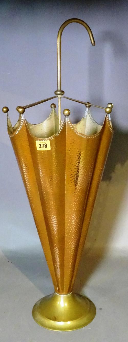 An early 20th century beaten copper stick stand formed as an umbrella, 78cm high.   G3