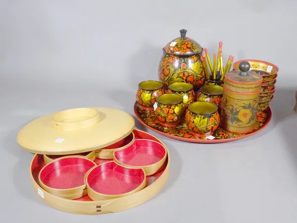 Collectables including; a 20th century canteen of brass cutlery, a Russian lacquer soup set and a set of Asian lacquer rice bowls, (qty).   S1B