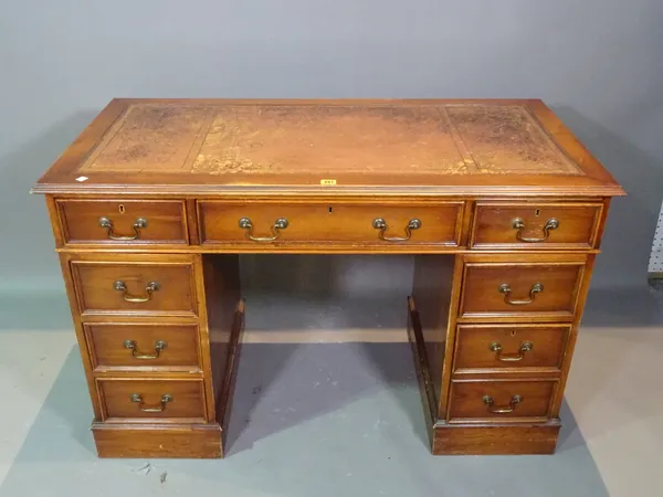 A 20th century mahogany pedestal desk with tan leather inset top, 120cm wide x 70cm high.  BAY 1