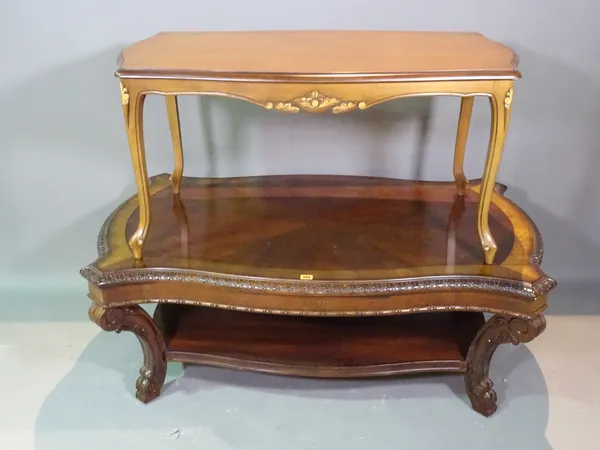 A Regency style mahogany serpentine coffee table on scroll supports, 132cm long x 48cm high and another coffee table, 108cm wide x 52cm high, (2).   E