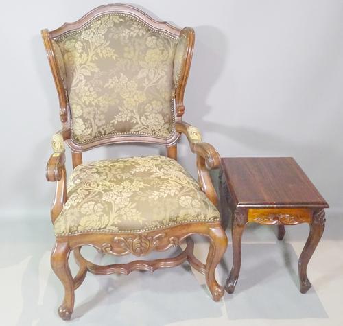 A 20th century hardwood framed wingback open armchair with green studded upholstery and matching side table, 46cm wide x 47cm high, (2).   D6