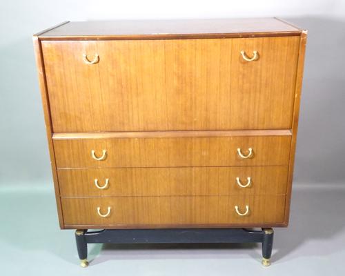 An E-Gomme 20th century G-Plan sideboard with cupboard and three long drawers on ebonised base, 97cm wide x 103cm high.   A8