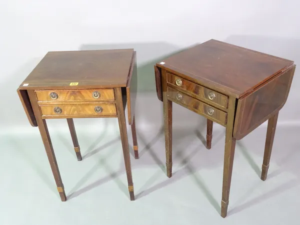 A pair of 20th century mahogany drop flap bedside tables with two drawers on square tapering supports, 46cm wide x 69cm high.   C7