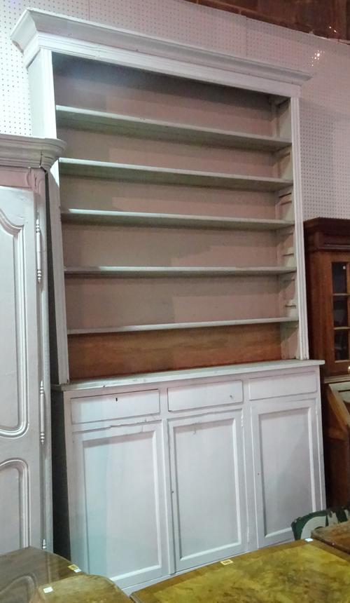 An early 20th century pine shopkeeper's display dresser with three drawers over three door cupboard base, 164cm wide x 296cm high.   F10