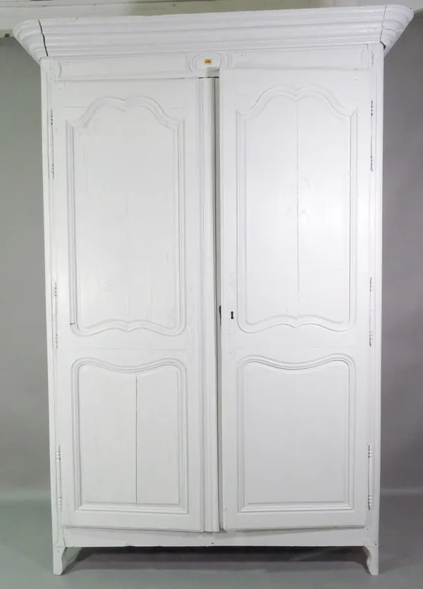 A 20th century French white painted two door armoire, 135cm wide x 210cm high.   E10