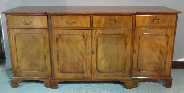 A 20th century breakfront sideboard with four drawers over four panelled, doors, 193cm wide x 92cm high.  L7