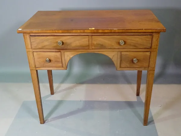 A 19th century mahogany kneehole writing desk, 94cm wide x 82cm high and a mahogany open armchair, (2). G9