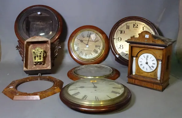 A large quantity of mostly 19th century and later dial and wall clocks, some lacking movements, (qty).   ROST