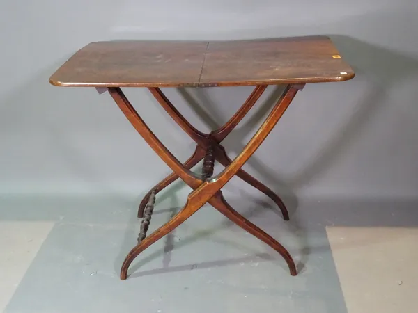 A 19th century mahogany coaching table on walnut supports, 90cm wide x 75cm high.   G3