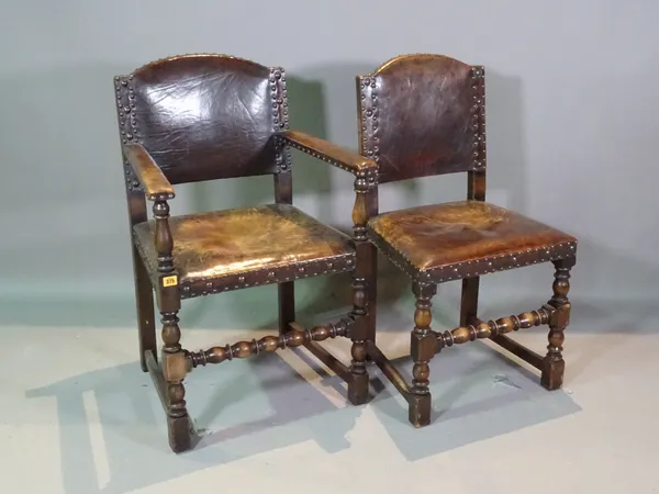 A set of six 18th century style studded leather upholstered dining chairs to include two carvers, (6).   G6
