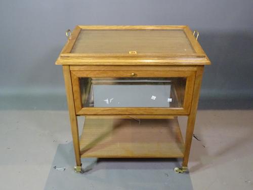 A 20th century oak and glass serving trolley with lift out tray, 65cm wide x 78cm high.    K8