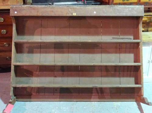 An early 20th century oak three tier dresser top, later painted brown, 159cm wide x 121cm high.    EXTRA