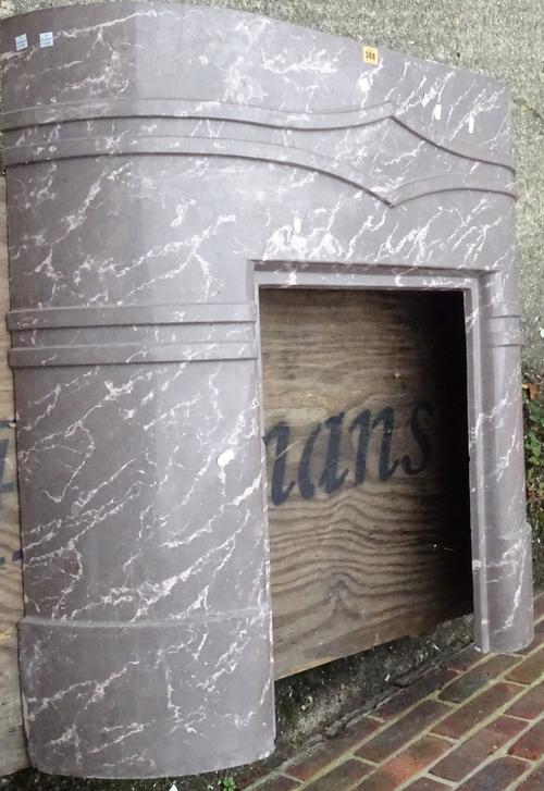 A modern marble grey and pink veined fire surround, 99cm wide x 96cm high, aperture 46cm wide x 60cm high and a brass fire fender, (2).    OUT