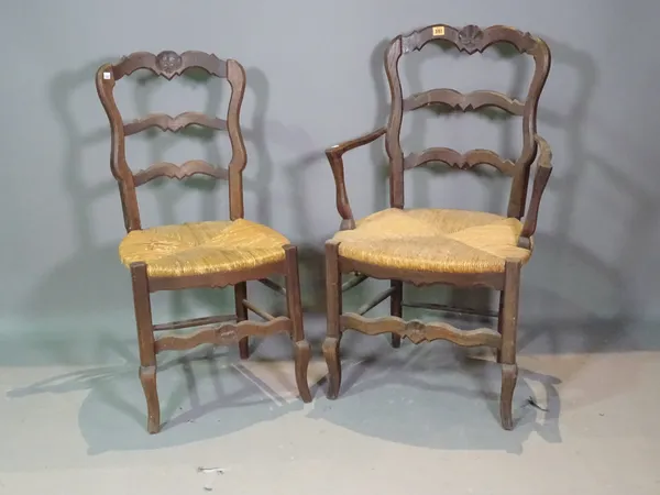 A set of  four French ladder back dining chairs and an ash and elm wheelback chair, (5).  H6