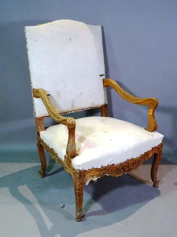 A Louis XVI style beech open armchair with carved decoration.  D6