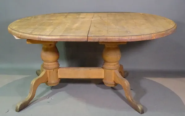 A 20th century pine extending dining table with two extra leaves, 160cm long x 78cm high, 240cm fully extended.   BAY 2