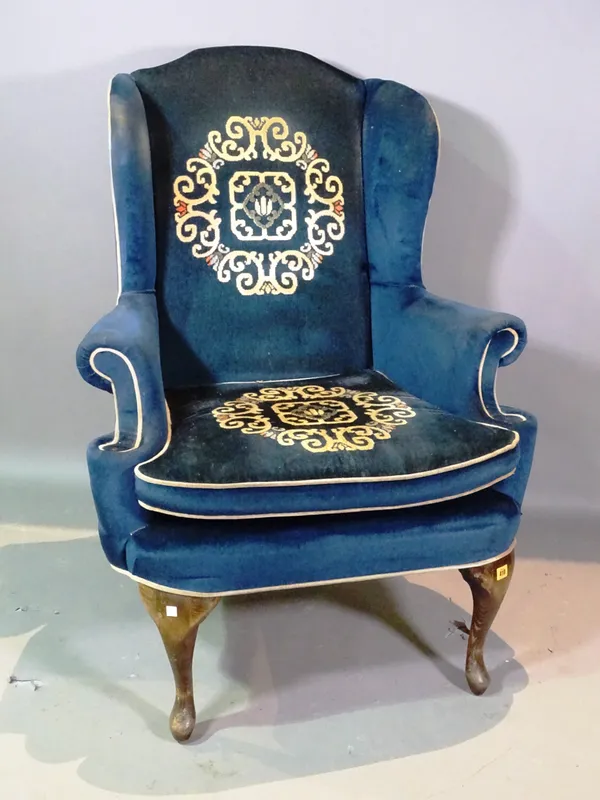 A Victorian mahogany framed wingback armchair and a Victorian mahogany nursing chair, (2).   G5