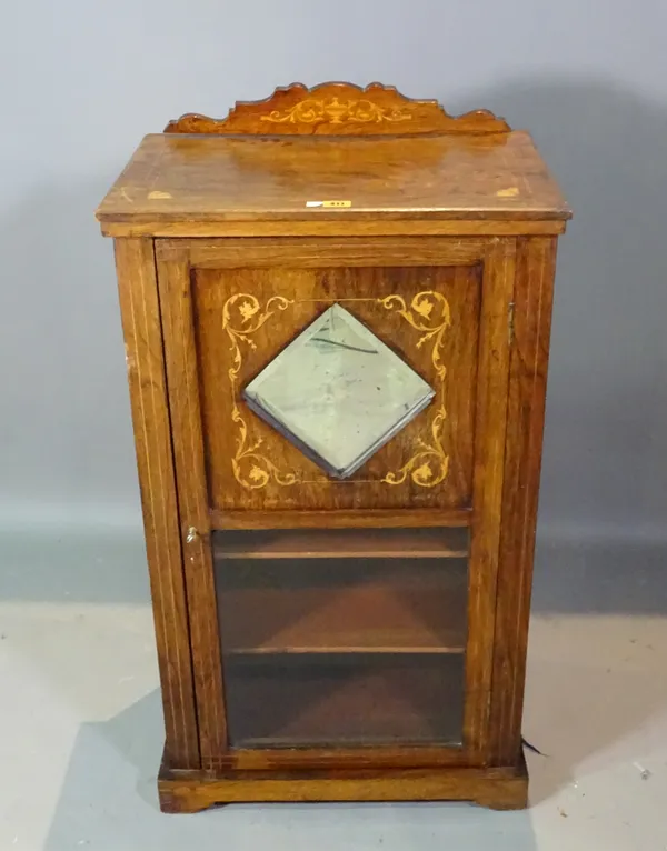 A Victorian rosewood music cabinet, 54cm wide x 93cm high.   F6