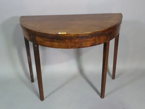 A George III mahogany bowfront tea table on square tapering supports, 95cm wide x 74cm high.   D4