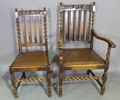 A set of six 17th century style oak stick back chairs on barley-twist supports.   BAY 1