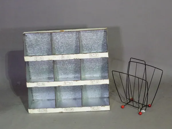 20th century industrial design; a graduated set of filing shelves, 62cm wide x 60cm high, together with a mid-20th century Atomic Sputnik magazine rac