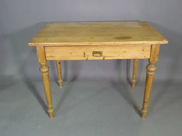 An early 20th century pine single drawer side table on tapering supports, 105cm wide x 82cm high. L5