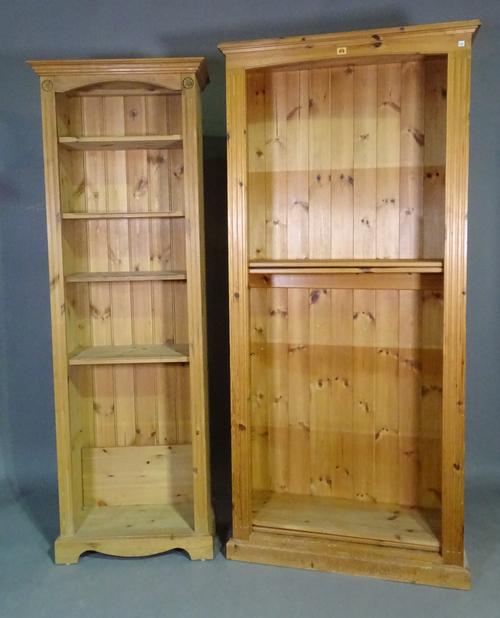 A 20th century pine four tier floor standing open bookcase with fluted edges on plinth base, 89cm wide x 193cm high and another smaller, 64cm wide x 1