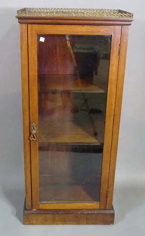 A Victorian mahogany display cabinet, the gilt metal galleried top over single glazed door, 50cm wide x 115cm high.  F5