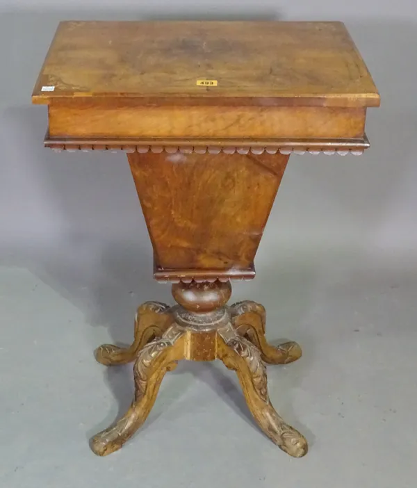 A Victorian walnut and inlaid work table on square tapering column and four downswept supports, 52cm wide x 73cm high.   J7