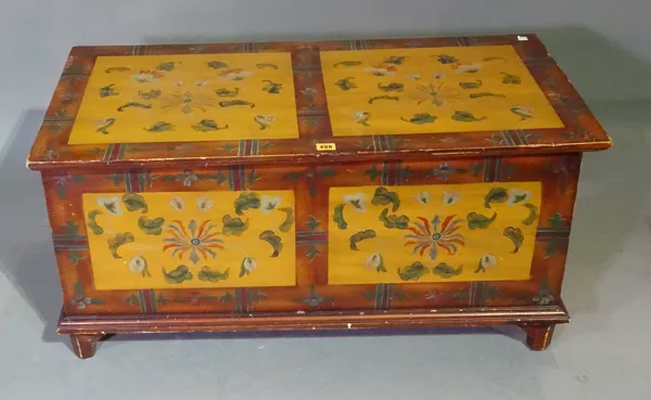 A 20th century painted hardwood lift top trunk, 97cm wide x 47cm high. L6
