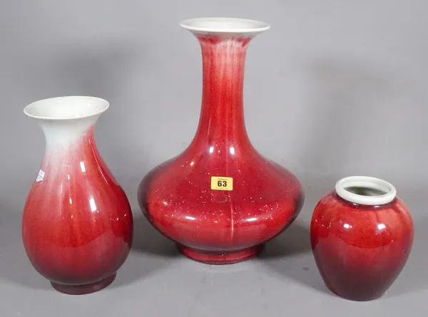 A group of three 20th century Asian sang de boeuf ceramic vases, the largest 40cm tall.  S1M
