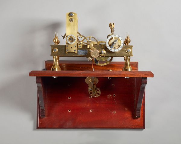 A Modern brass turret timepieceBy Sydney Creamer, circa 1980, after a design by John WildingWith brass plates and five-crossed wheelwork, deadbeat esc