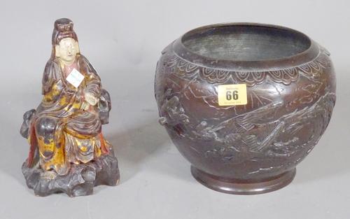 An early 20th century Japanese bronze bowl, 20cm diameter, modelled with birds and a 19th century wooden painted model of Buddha, 13cm tall.   CAB