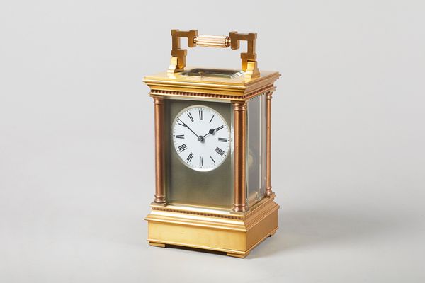 A French gilt brass 'Giant' repeating carriage clock.Retailed by Boxell, Brighton, circa 1900In an Anglaise riche case, with square-shaped fluted hand