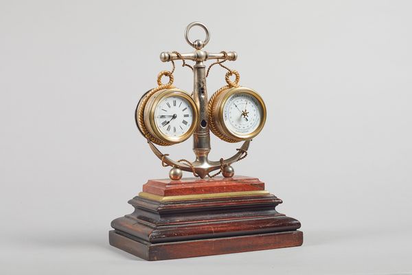 A French gilt and silvered, marble mounted maritime theme timepiece and barometerCirca 1880Centred with a silvered anchor and rope twist, flanked to e