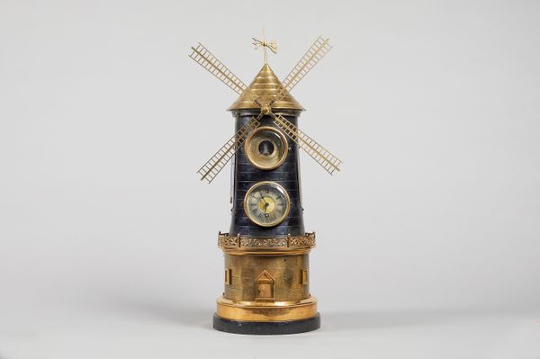A Gilt brass and bronze patinated Windmill timepiece compendiumModelled as a four-sailed windmill, with a conical roof, the tapering body with two the