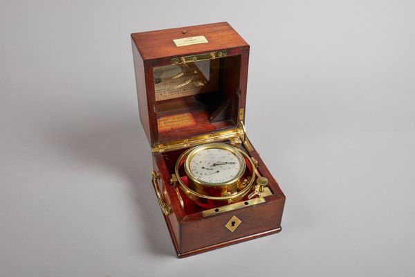 A Napoleon III mahogany and brass-mounted two-day marine chronometerBy Vissière, Paris, No. 230, circa 1860The plain mahogany three-tier case, with re
