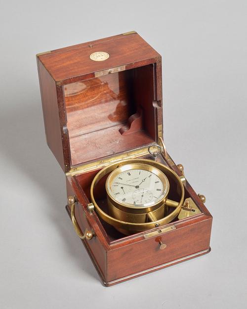 A French mahogany and brass-mounted two-day marine chronometerBy Jacob & Scharf, St Nicholas , No. 313, circa 1860The three-tier case with hinged lid