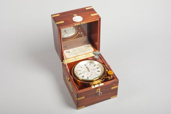 A mahogany and brass-bound two-day marine chronometer with Poole's Auxillary CompensationFor Russells Ltd, 18 Church Street, Liverpool, No 6702, proba