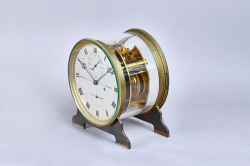 A brass and glass-cased eight-day mantel chronometerBy Thomas Adams, 36 Lombard Street, London, circa 1855, the glazed case and foot laterThe one-piec