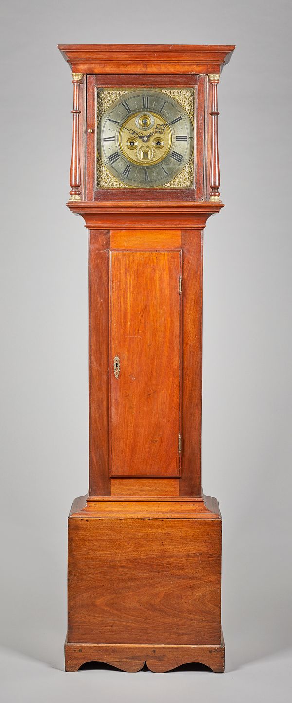 A  mahogany longcase clockBy John Groom, Colchester, the movement circa 1710, the case laterThe moulded pediment, above a pair of baluster-turned coul