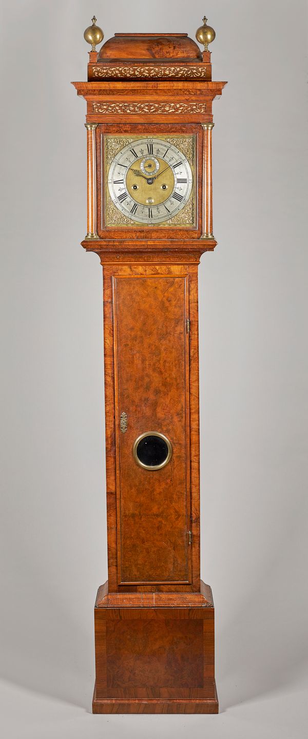 A George I Walnut month-going longcase clockBy Joseph Windmills, London, First quarter 18th Century and laterThe case with a domed caddy pediment, sur