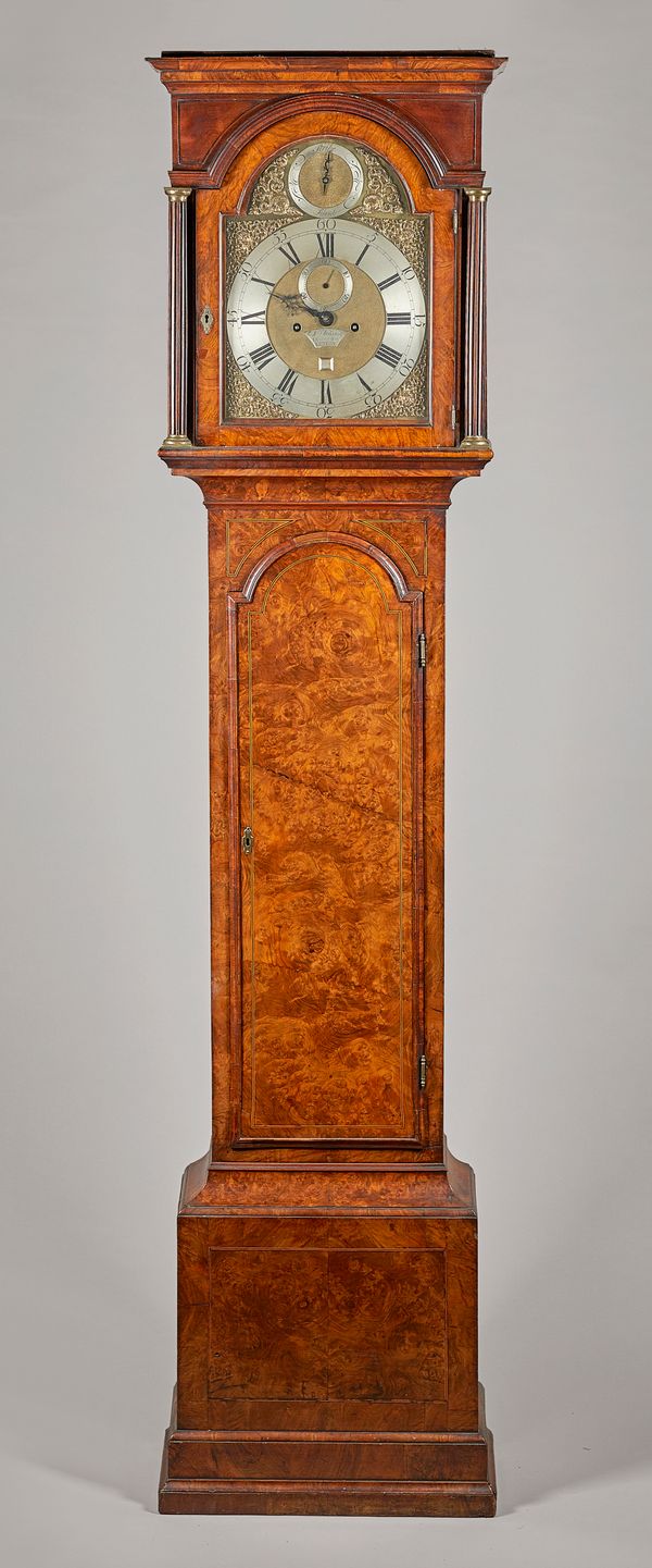 A George I walnut, boxwood and ebony outlined longcase clockBy William Webster, Exchange Alley, London, circa 1725The hood with a moulded pediment abo
