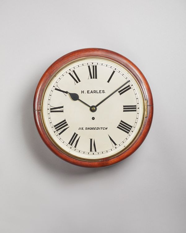 A mahogany circular dial clockFor H. Earles, 115 Shoreditch, London, circa 1890With glazed brass bezel, blued steel spade hands, the 12in. cream-paint