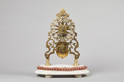 A Victorian skeleton timepiece and domeCirca 1890The movement with pierced plates and chain fusée and anchor escapement, on a stepped white marble pli