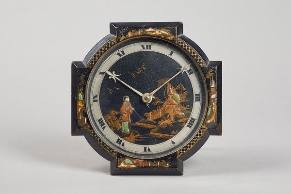 An Edwardian chinoiserie decorated wood and brass strut timepieceThe movement by Buren, Switzerland, circa 1920The shaped case decorated with pavilion