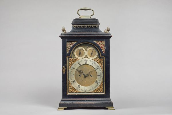 A George III giltmetal-mounted ebonised bracket clockBy Jonathan de Jersey, Westminster, circa 1790The bell top case surmounted by a carrying handle a