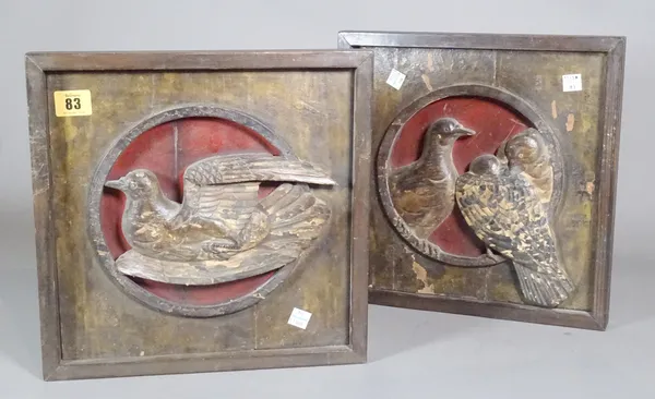 A pair of early 20th century carved panels depicting birds probably Asian, each 30cm square, (2).  CAB